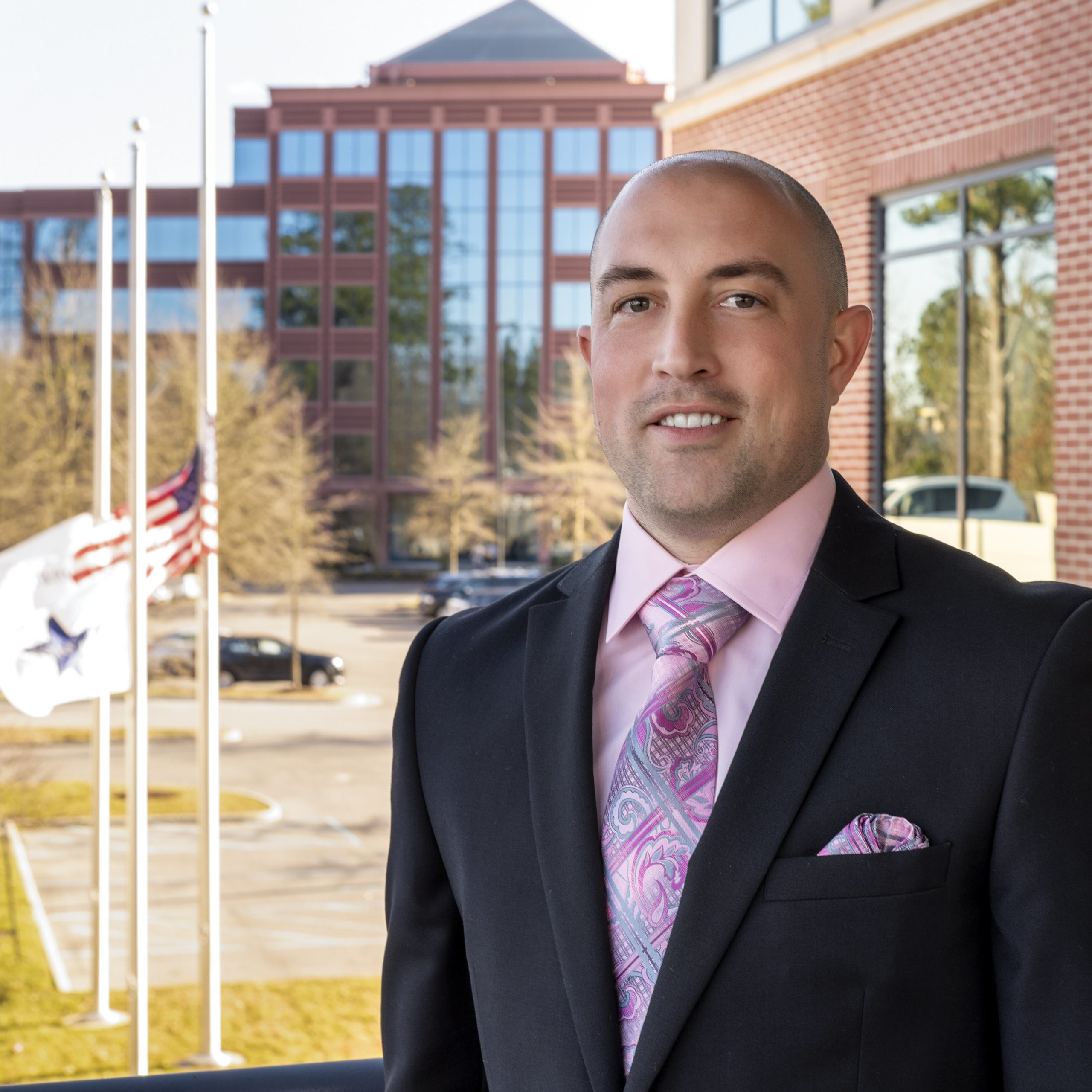Military-focused real estate agent outside an office building